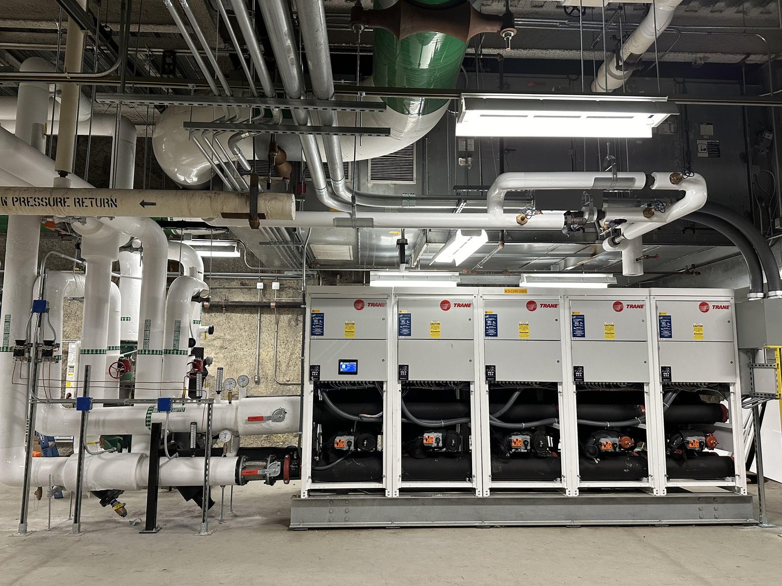 Water cooled chiller and pumping arrangement